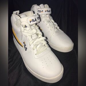 Volc 13 size 6 like new mid white, FILA high top with yellow and blue stripes.